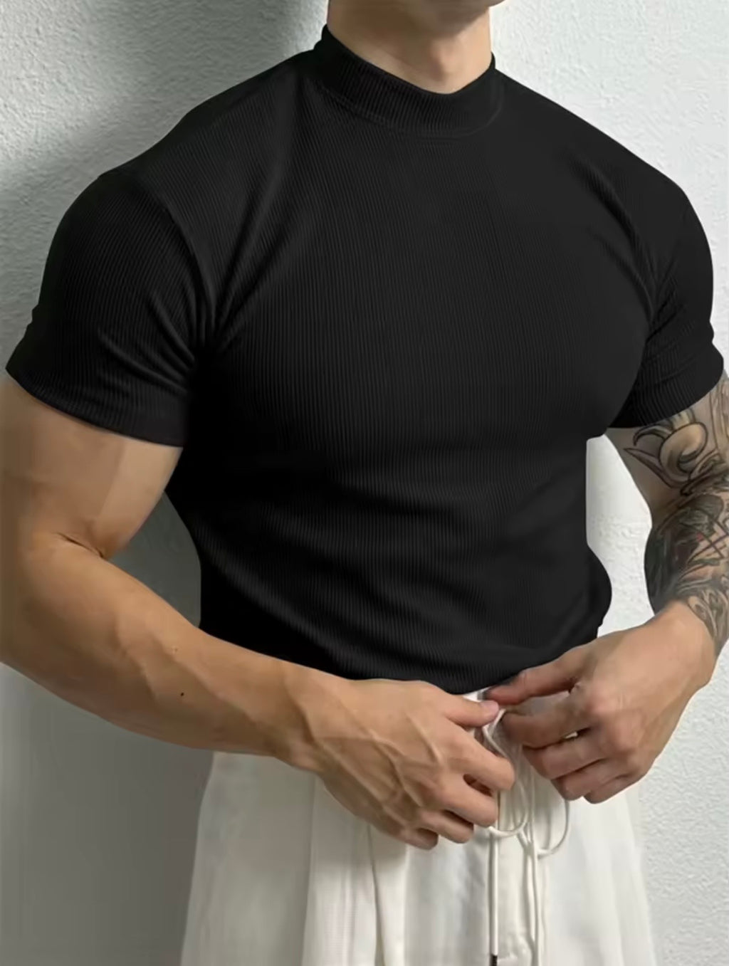Camiseta de moda de primavera y verano para hombre, camisa a rayas con cuello alto pequeño, camiseta deportiva de manga corta.