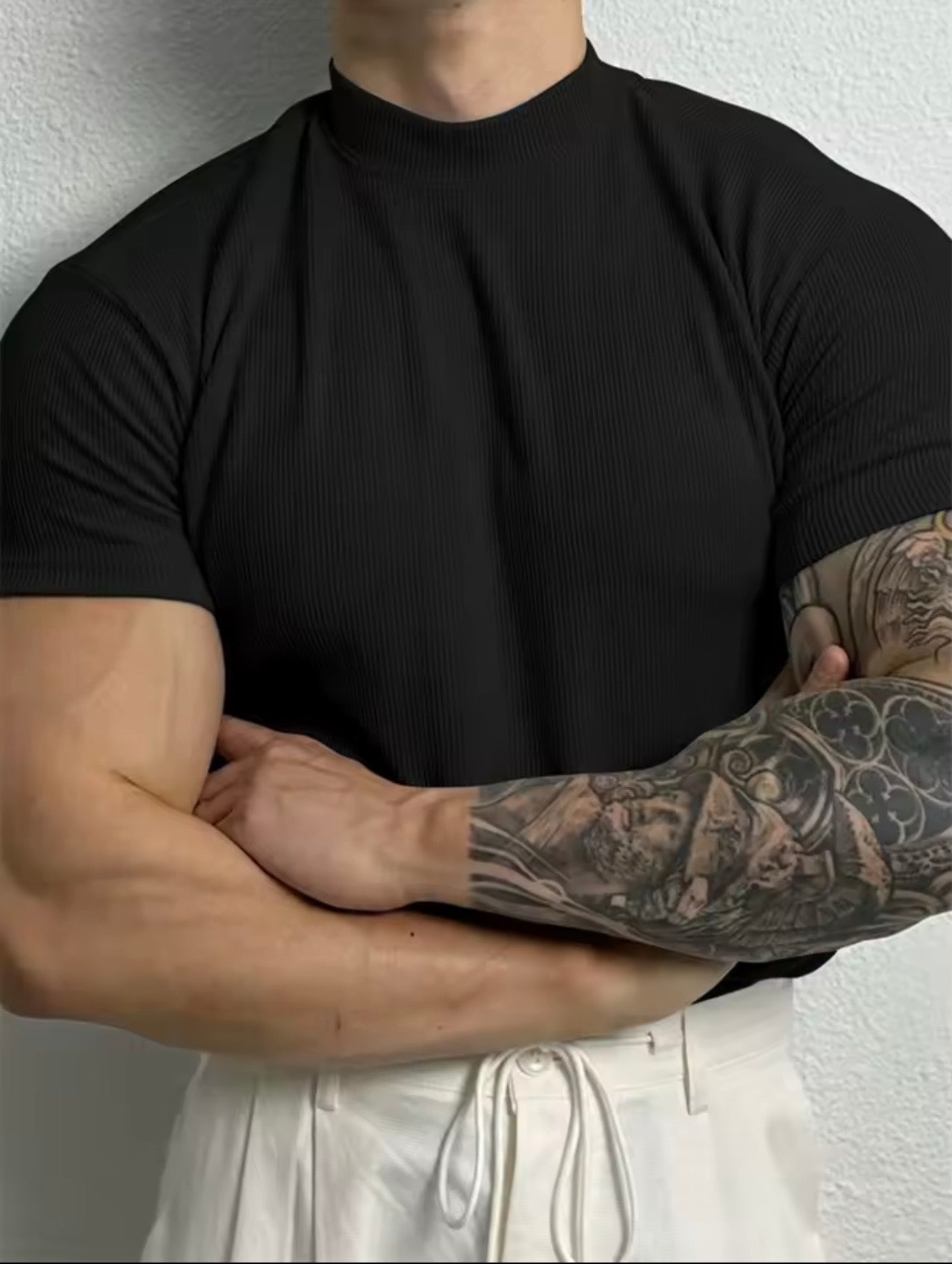 Camiseta de moda de primavera y verano para hombre, camisa a rayas con cuello alto pequeño, camiseta deportiva de manga corta.