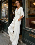 Martina – Elegante mono con escote en V y perneras anchas – Elegante mono con escote en V y perneras anchas