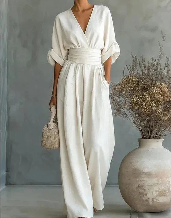 Martina – Elegante mono con escote en V y perneras anchas – Elegante mono con escote en V y perneras anchas